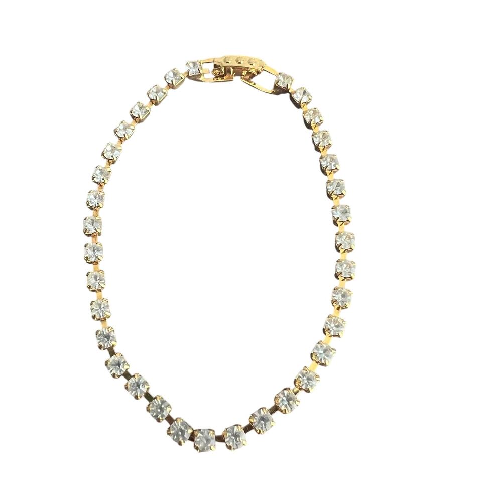 Rhinestone studded gold tone simple elegant tennis bracelet
